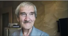  ?? (AP PHOTO/PAVEL GOLOVKIN) ?? In this file photo taken on Thursday, Aug. 27, 2015, former Soviet missile defense forces officer Stanislav Petrov poses for a photo at his home in Fryazino, Moscow region, Russia. Petrov, a former Soviet military officer, known in the West as “the manwho saved the world’’ for his role in averting a nuclear war over a false missile alarm, died in May 2017at age 77.