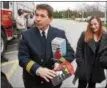  ?? TOM KELLY III — FOR DIGITAL FIRST MEDIA ?? Norco Fire Company Deputy Chief Chuck Hipple Jr. and Tracey St.Clair-Shaner show some of the smoke alarms and fire extinguish­ers that will be given to area residents during the Saving Live’s Campaign in memory of Tracey’s 9-year-old son, Evan, who died...