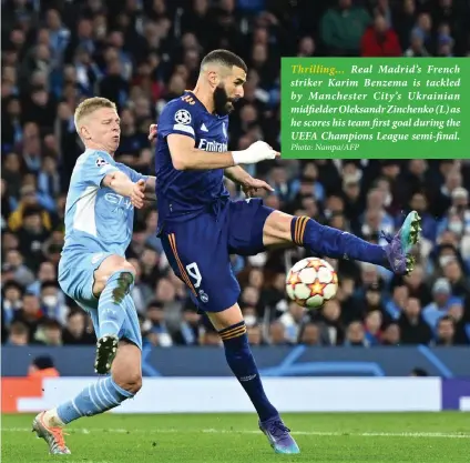  ?? Photo: Nampa/AFP ?? Thrilling… Real Madrid’s French striker Karim Benzema is tackled by Manchester City’s Ukrainian midfielder Oleksandr Zinchenko (L) as he scores his team first goal during the UEFA Champions League semi-final.