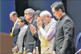  ?? PTI ?? PM Modi with law minister Kiren Rijiju and CJI DY Chandrachu­d on Saturday.