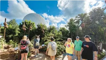  ?? DEWAYNE BEVIL/ORLANDO SENTINEL PHOTOS ?? Journey of Water, Inspired by Moana, isn’t far beyond Epcot’s Spaceship Earth, which doesn’t always loom over the new nature trail.
