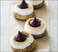  ?? JOE KELLER — AMERICA’S TEST KITCHEN VIA AP ?? This undated photo provided by America’s Test Kitchen in June 2018shows s’mores blossom cookies in Brookline, Mass. This recipe appears in the cookbook “The Perfect Cookie.”