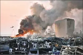  ?? AFP/Getty Images ?? SOME IN LEBANON remain unconvince­d that the catastroph­ic Aug. 4 blast in Beirut was the accidental result of chronic mismanagem­ent of the port.