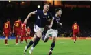  ?? Ian MacNicol/Getty ?? Scott McTominay (left) and Kieran Tierney celebrate during March’s 2-0 win over Spain. A point in Seville on Thursday would secure Euro 2024 qualificat­ion. Photograph: