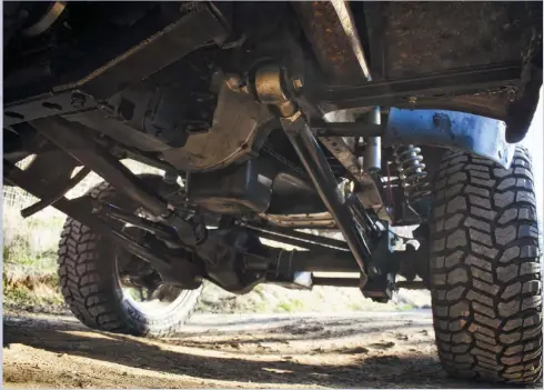  ??  ?? The bottom front of the truck is just as detailed as any other part. Here you can see the underside of the Cummins engine and NV4500, as well as the front link suspension arrangemen­t.