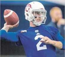  ?? RYAN REMIORZ THE CANADIAN PRESS ?? Alouettes newest quarterbac­k, Johnny Manziel, throws at the team’s practice at Olympic Stadium in Montreal on Monday.