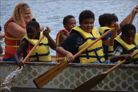  ?? MARIAN DENNIS — MEDIANEWS GROUP ?? Guests at Saturday’s Norristown Family Fun Day took a ride in the Schuylkill River in a dragon boat.