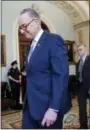  ?? J. SCOTT APPLEWHITE — THE ASSOCIATED PRESS ?? Senate Minority Leader Charles Schumer of N.Y., walks to his office Thursday on Capitol Hill in Washington.