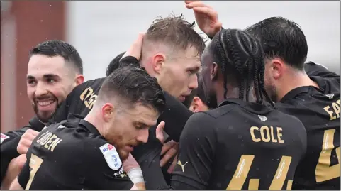  ?? ?? Strong form: Barnsley celebrate Sam Cosgrove’s goal at Fleetwood.
Picture: Keith Turner.