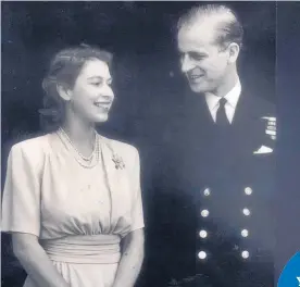  ?? Photo / File ?? HRH Princess Elizabeth and Lieutenant Philip Mountbatte­n pose for their first engagement pictures at Buckingham Palace.