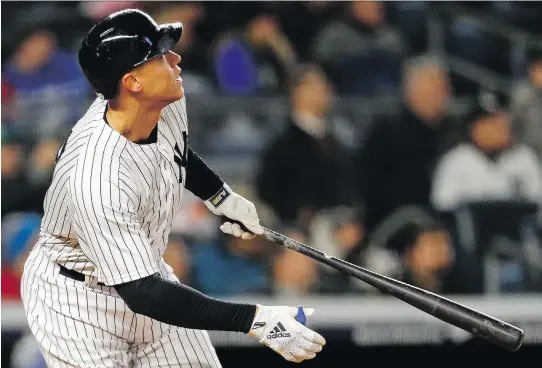  ?? ADAM HUNGER/GETTY IMAGES ?? No player typifies the all-or-nothing trend in MLB more than New York Yankees slugger Aaron Judge, who hit 52 homers in 2017 but struck out 208 times.