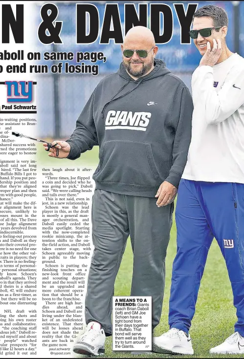  ?? AP ?? A MEANS TO A FRIENDS: Giants coach Brian Daboll (left) and GM Joe Schoen have a tight bond from their days together in Buffalo. That bond will serve them well as they try to turn around the Giants.