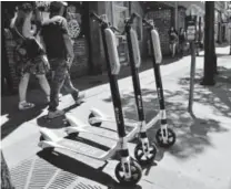  ?? Hyoung Chang, Denver Post file ?? Denver officials said the city’s new “dockless mobility technology” pilot program will include bicycles and electric scooters.