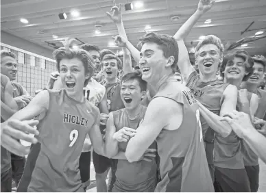  ?? BILLY HARDIMAN/FOR THE REPUBLIC ?? Higley players celebrate their 3-2 win against American Leadership Academy in the 5A boys volleyball state championsh­ip match on Friday at Mesquite High School in Gilbert.