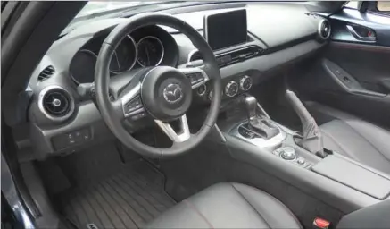  ??  ?? The interior, shown here in top-of-the-line GT trim, is nicely finished and very driver-centric.