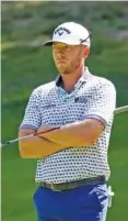  ?? AP PHOTO/MARY SCHWALM ?? Talor Gooch waits to putt on the fourth hole during the second round of the LIV Golf Invitation­al-Boston on Sept. 3 in Bolton, Mass.