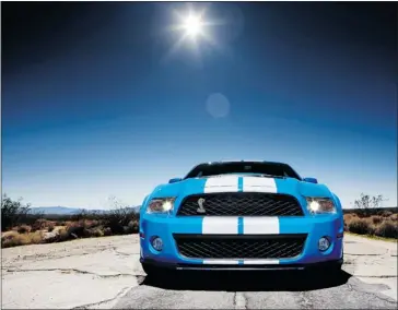  ?? Ford ?? The aluminum power dome hood is a dead giveaway for the Mustang Shelby GT500 — setting it apart from the rest of the pony-cars in Ford’s corral. It’s also functional, helping to cool the engine through heat extractors.