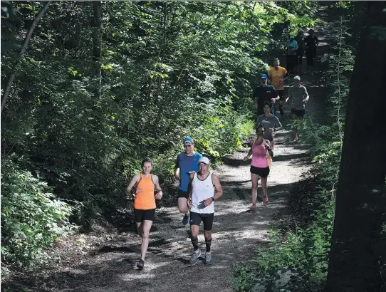  ?? PHOTOS: CHRISTINNE MUSCHI ?? Ultra-trail running on Mount Royal can acquaint Montrealer­s with a part of the landscape we often take for granted.