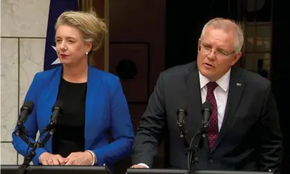  ?? Photograph: Marc Tewksbury/AAP ?? Bridget McKenzie and Scott Morrison speak to the media during a press conference at Parliament House last week. A report has found McKenzie, the former sports minister, may have lacked power to hand out $100m in sports grants targeted at marginal seats.