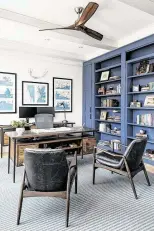  ??  ?? Shelves in Price Magness’ at-home office are Benjamin Moore’s deep-blue Hudson Bay.