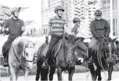  ??  ?? Ismail Bakar (middle) riding a horse with Putrajaya Corporatio­n (Ppj) president Aminuddin Hassim (right) before the Putrajaya Car Free Day Programme yesterday. - Bernama photo