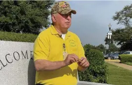  ?? CARL VINSON
VA Medical Center ?? Gus Allbritton with the Purple Heart medal that was recently returned to him.