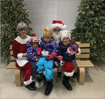  ?? PHOTO PROVIDED ?? Take a stroll through an enchanted trail covered in twinkling lights, visit with Santa and Mrs. Claus, enjoy hot cocoa, and more at Mid Michigan College Harrison Campus’ lighted North Pole Passage Holiday Trail