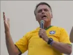  ?? Andre Penner/Associated Press ?? Former President Jair Bolsonaro and some of his former top aides are under investigat­ion into allegation­s they plotted a coup to remove his successor, Luiz Inacio Lula da Silva.