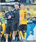 ?? ?? Livingston’s Scott Pittman (right) and head coach Glenn Whelan.
