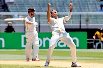  ?? AFP ?? TOP PERFORMANC­E: James Pattinson celebrates the dismissal of Kane Williamson on the fourth day of the second Test in Melbourne. —