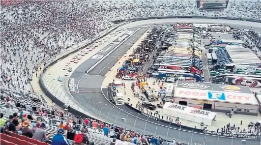  ??  ?? At one time, you couldn’t get a seat, but Martinsvil­le Speedway in Virginia was more than half empty when NASACAR raced there Sunday.