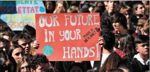  ??  ?? Across the globe, young people have been taking to the streets demandin action on climate change.