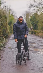  ??  ?? In nature... on a walk.
Ryan Nyambe and Huncho