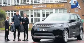  ??  ?? Leigh Halfpenny surprised RWC mascot Noah Barton and sister Elise by picking them up and taking them to school at Llanishen High in Cardiff