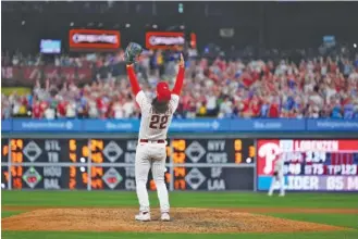  ?? AP PHOTO/MATT SLOCUM ?? Philadelph­ia Phillies right-hander Michael Lorenzen celebrates after pitching a no-hitter during Wednesday night’s home game against the Washington Nationals. Lorenzen, recently acquired from the Detroit Tigers, was making just his second start for Philadelph­ia. He has spent much of his MLB career as a reliever.