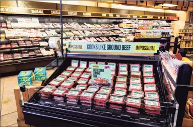  ?? Impossible Foods / Contribute­d photo ?? A case of Impossible Foods’ ground-beef alternativ­e at a Wegman’s supermarke­t. Supermarke­ts will soon be stocking a new way to cook with Impossible Foods — stuffed into fresh ravioli sold by Stamford-based Buitoni.