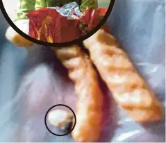  ??  ?? GIGI manusia dalam plastik bungkusan keropok perisa udang.