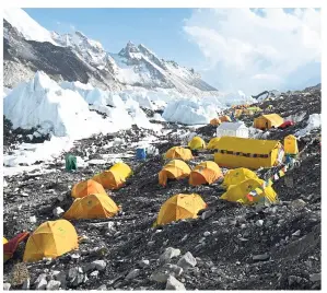  ?? Photos: AFP ?? Tents at the Everest base camp, some 140 km northeast of Kathmandu. The Everest industry is suffering from a dangerous shortage of experience­d sherpa guides. —
