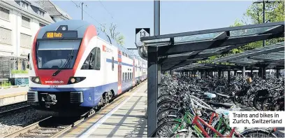  ??  ?? Trains and bikes in Zurich, Switzerlan­d