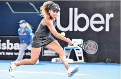  ?? — AFP photo ?? Naomi Osaka hits a return against Destanee Aiava during their women's singles first round match at the Brisbane Internatio­nal.