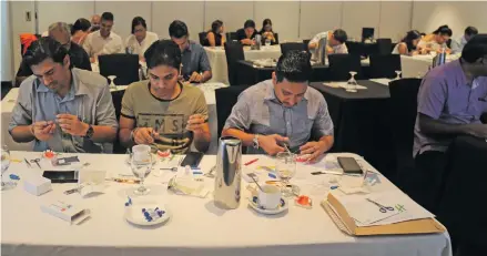  ?? Photo: Simione Haravanua ?? Dentists undergo hands-on-training on bone preservati­on and regenerati­on during the Fiji Dental Associatio­n Annual Conference at the Holiday Inn, Suva, on August 4, 2019.