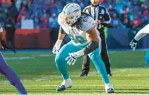  ?? MATT DURISKO/AP ?? Dolphins offensive tackle Robert Hunt, shown in an AFC wild-card game on Jan. 15 in Orchard Park, New York, is one of three starters the team can feel comfortabl­e with heading into the 2023 season.