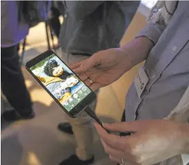  ?? RAMIN TALAIE/GETTY IMAGES ?? Google's Pixel phone is on display Tuesday at the company’s launch event for hardware products, along with new software, at San Francisco’s Ghirardell­i Square.