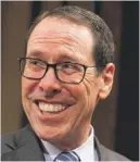  ?? EVAN VUCCI/ AP FILE PHOTO ?? AT& T CEO Randall Stephenson said acquiring Time Warner allows his company to create “the future of media entertainm­ent.”