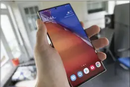  ??  ?? The 6.9in screen on the Galaxy Note20 Ultra definitely needs two hands to operate.