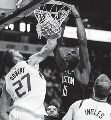  ?? Mark Mulligan / Staff photograph­er ?? Rockets center Clint Capela, right, once again gets to take on his Jazz counterpar­t and role model, Rudy Gobert, during a playoff series. Capela’s side got the better of Gobert’s during last year’s postseason.