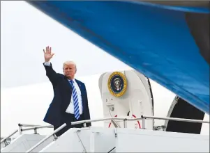  ?? AP PHOTO ?? President Donald Trump waves as he boards Air Force One at Love Field in Dallas, Friday, after speaking to the annual Nation Rifle Associatio­n convention.