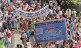  ??  ?? Anti-nuclear protesters march in Pape’ete, the capital of Tahiti in French Polynesia, in 1995, denouncing French nuclear testing on Mururoa atoll. Photograph: Romeo Gacad/AFP