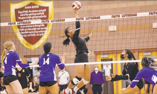  ?? Erik Verduzco Las Vegas Review-journal @Erik_verduzco ?? Liberty’s Romona Pulu skies above the net against Sierra Vista during a Class 4A volleyball state semifinal match on Thursday.