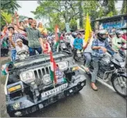  ?? AP ?? Congress supporters during a road show in Titabor in upper Assam on Tuesday.